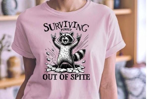 Surviving Out of Spite Raccoon Sweatshirt - Funny Graphic Tee