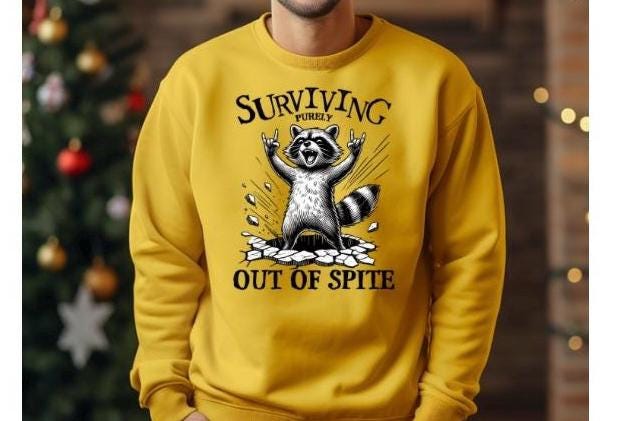 Surviving Out of Spite Raccoon Sweatshirt - Funny Graphic Tee