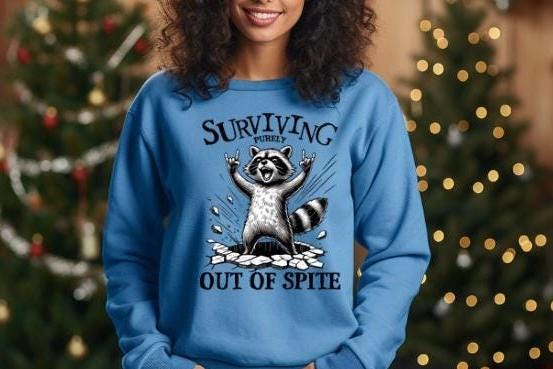 Surviving Out of Spite Raccoon Sweatshirt - Funny Graphic Tee