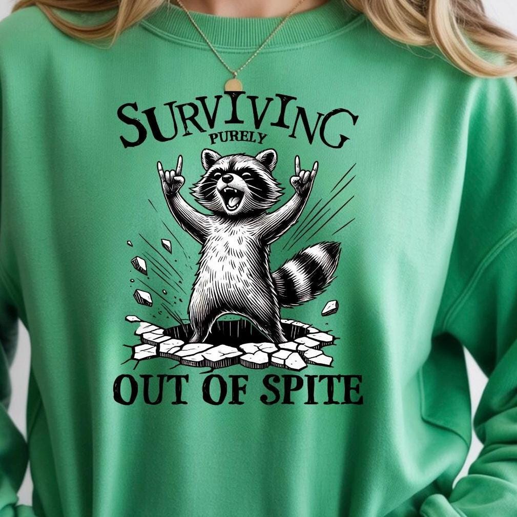 Surviving Out of Spite Raccoon Sweatshirt - Funny Graphic Tee
