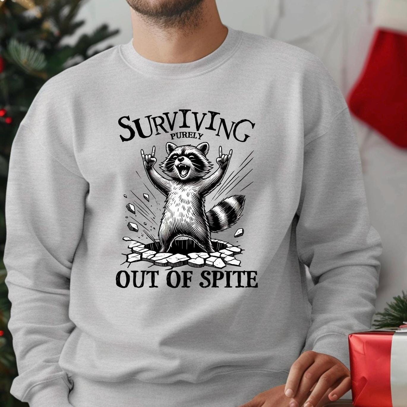 Surviving Out of Spite Raccoon Sweatshirt - Funny Graphic Tee