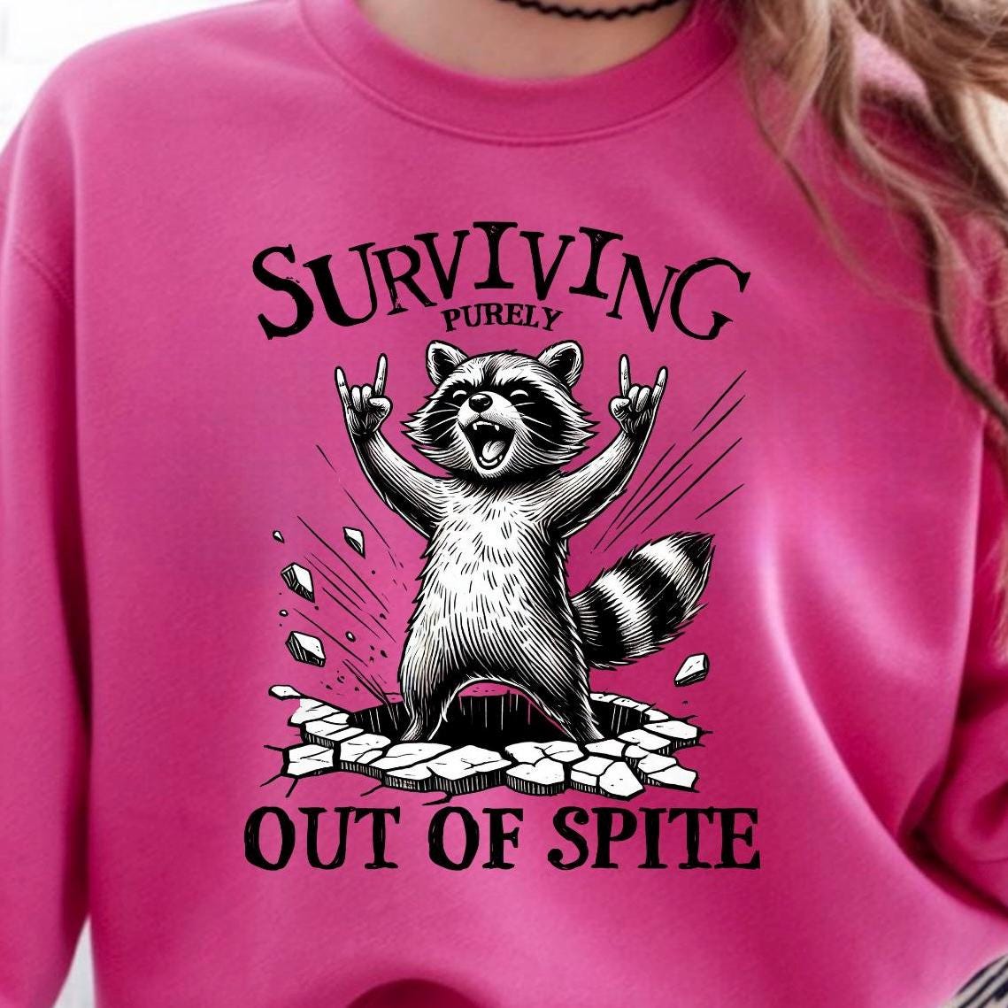 Surviving Out of Spite Raccoon Sweatshirt - Funny Graphic Tee